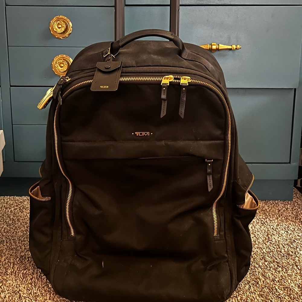 Tumi travel carryon roller bag/backpack/laptop bag
